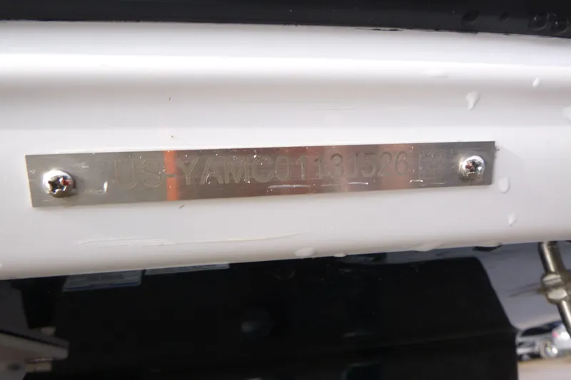Slide: The Image of 2026 Yamaha Boats 252S hull identification number plate on white surface. - 20