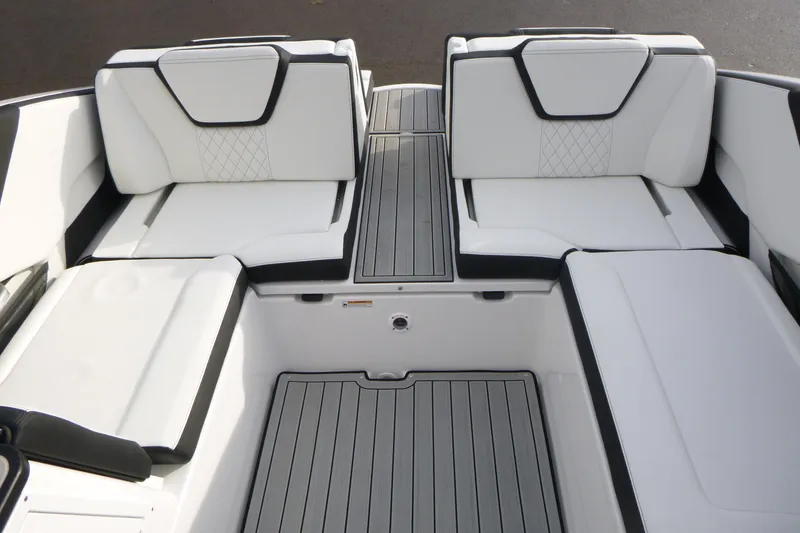 Slide: The Image of 2026 Yamaha Boats 252S interior seating with sleek white and black design. - 7