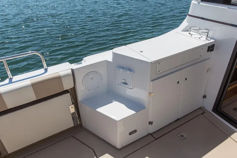 Slide: The Image of Manufacturer Provided Image: 2016 Cutwater 28 boat deck with storage compartments and seating. - 18