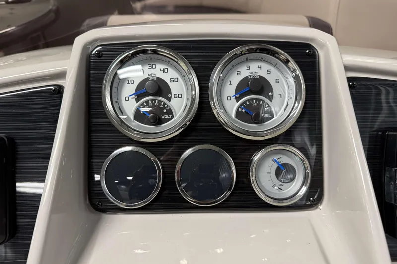 Slide: The Image of Dashboard of 2026 Sylvan Mirage 8520 CLZ DH with speedometer and fuel gauges. - 10