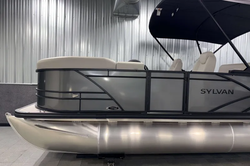 Slide: The Image of 2026 Sylvan Mirage 8520 CLZ DH pontoon boat in showroom, side view. - 20