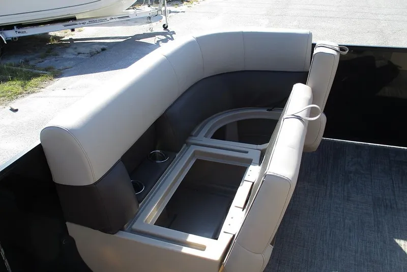 Slide: The Image of 2026 Bentley Pontoons Fish 243 N-Cruise interior seating with cup holders. - 11