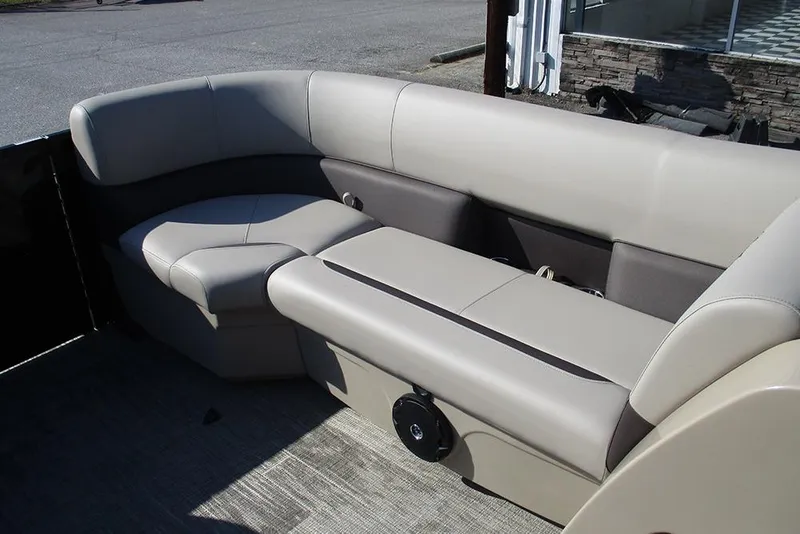 Slide: The Image of 2026 Bentley Pontoons Fish 243 N-Cruise interior seating, featuring luxurious beige upholstery. - 14