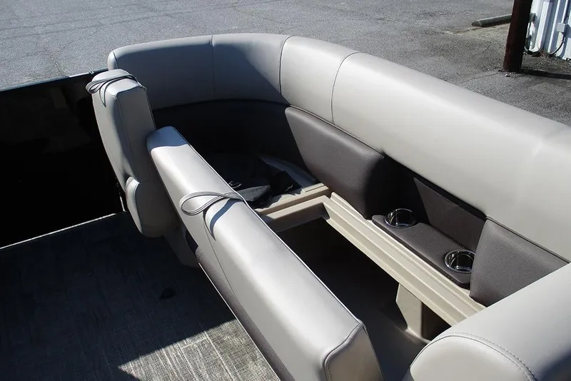 Slide: The Image of 2026 Bentley Pontoons Fish 243 N-Cruise interior seating with cup holders. - 15