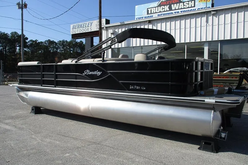 Slide: The Image of 2026 Bentley Pontoons Fish 243 N-Cruise pontoon boat displayed outdoors. - 2