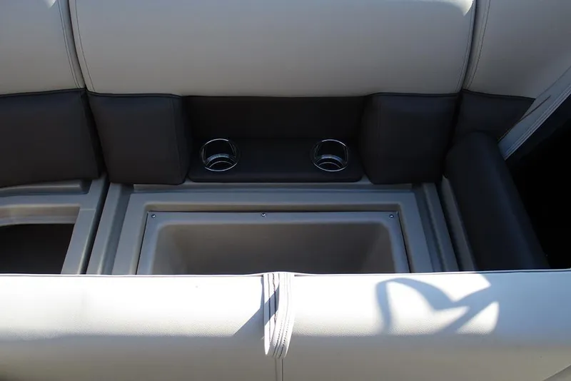 Slide: The Image of 2026 Bentley Pontoons Fish 243 N-Cruise interior seating with cup holders and storage. - 23