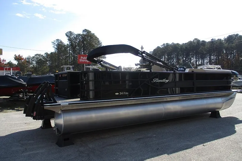 Slide: The Image of 2026 Bentley Pontoons Fish 243 N-Cruise pontoon boat displayed outdoors. - 6