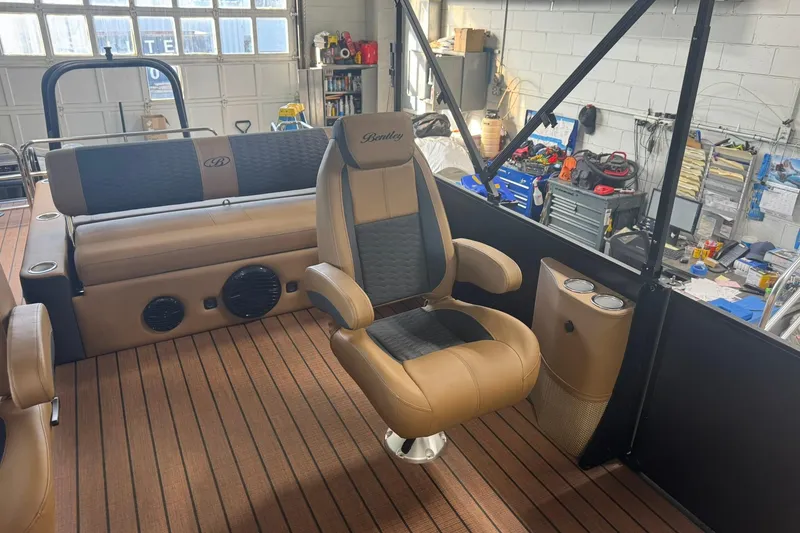 Slide: The Image of 2026 Bentley Pontoons Elite 253 Swingback interior with luxurious seating and modern design. - 20