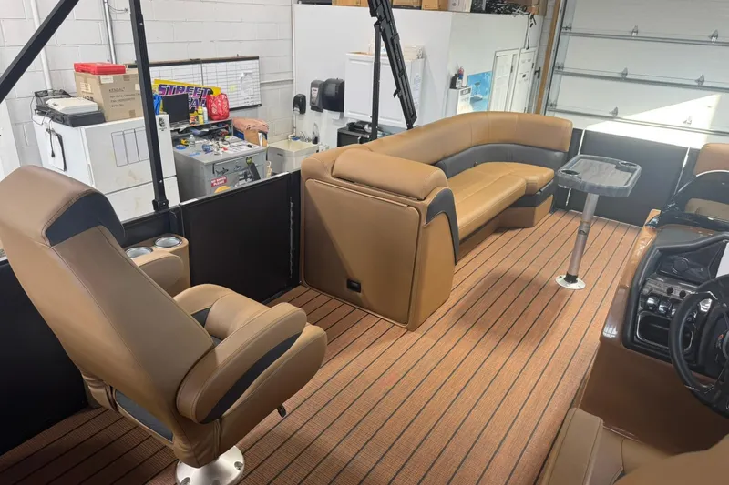 Slide: The Image of 2026 Bentley Pontoons Elite 253 Swingback interior with luxurious seating and modern design. - 21