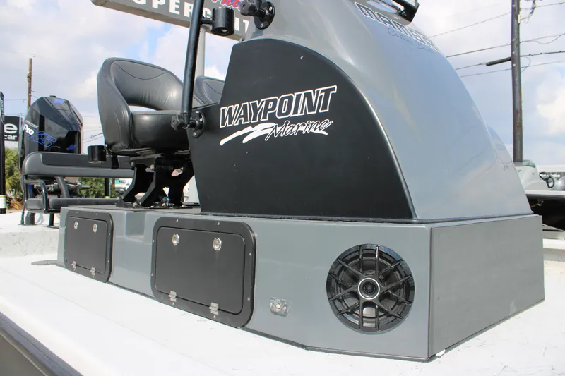 Slide: The Image of 2025 Mamba 24 Cat Classic boat with Waypoint Marine branding and seating. - 12