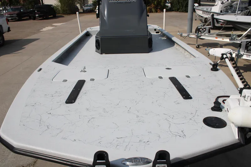 Slide: The Image of Dual seats on a 2025 Mamba 24 Cat Classic boat, featuring a modern console. - 4