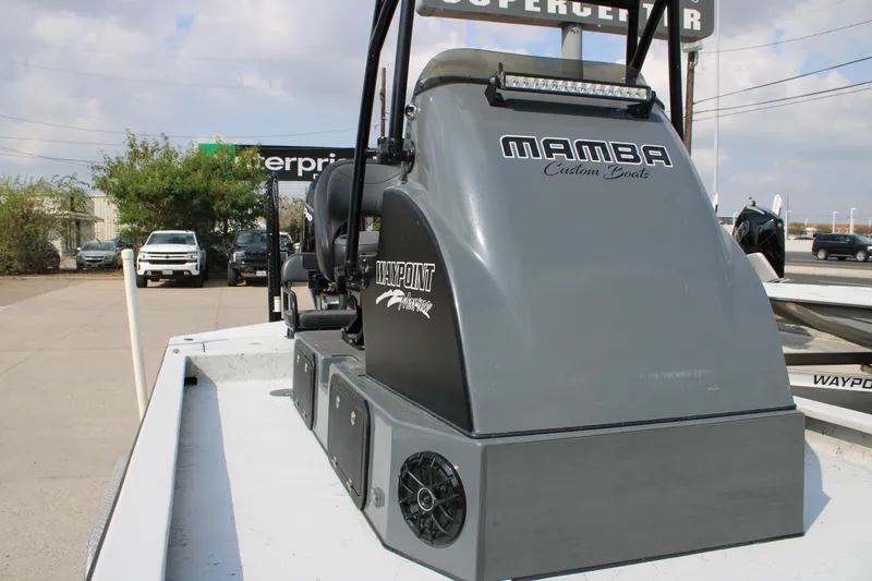 Slide: The Image of 2025 Mamba 24 Cat Classic boat with dual seats and powerful outboard motor. - 7