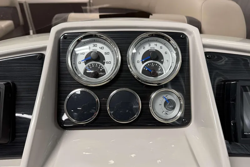 Slide: The Image of Dashboard of 2026 Sylvan Mirage 8520 LZ with speedometer and gauges. - 11