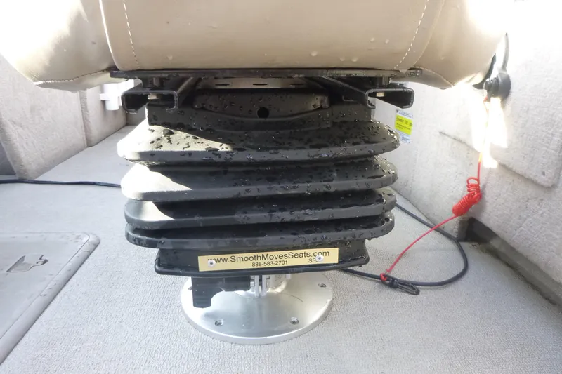 Slide: The Image of Boat seat suspension system in a 2012 Smoker Craft Ultima 172, featuring Smooth Moves technology. - 12