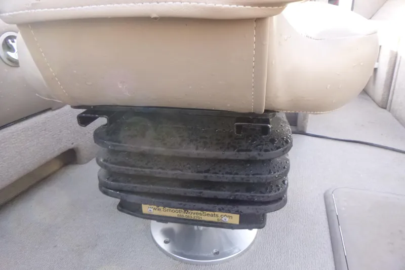Slide: The Image of Boat seat with shock absorber in a 2012 Smoker Craft Ultima 172. - 15