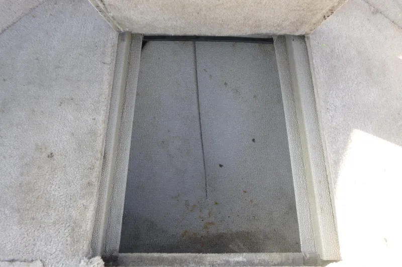 Slide: The Image of 2012 Smoker Craft Ultima 172 boat storage compartment, interior view. - 18