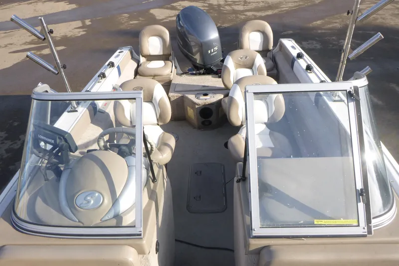 Slide: The Image of 2012 Smoker Craft Ultima 172 boat interior with seating and steering console. - 20