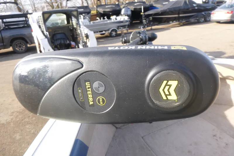 Slide: The Image of Minn Kota Ulterra motor on 2012 Smoker Craft Ultima 172 boat, parked outdoors. - 21