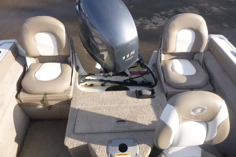 Slide: The Image of 2012 Smoker Craft Ultima 172 boat interior with Yamaha 115 engine and seating. - 8