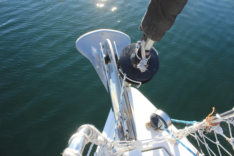 Slide: The Image of Bow of 2015 Jeanneau Sun Odyssey 349 sailboat with anchor and rigging. - 12