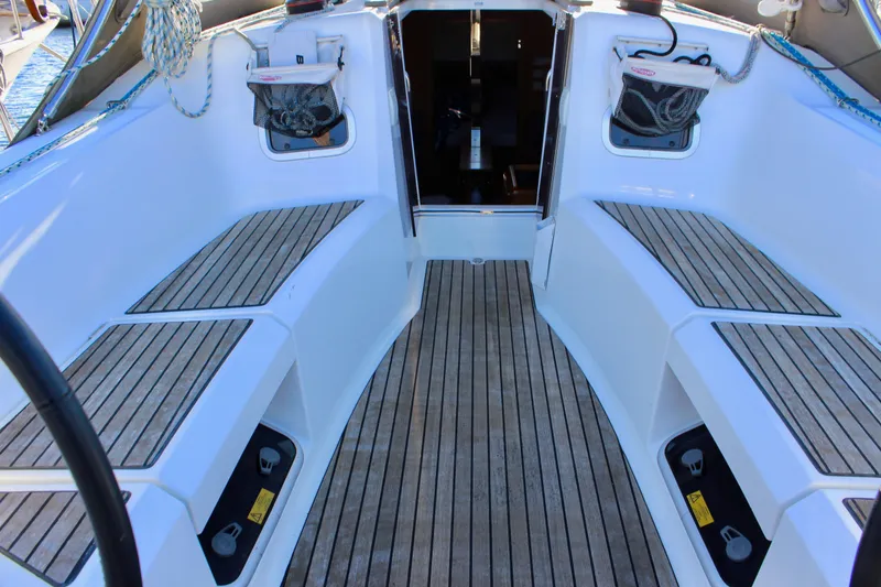 Slide: The Image of 2015 Jeanneau Sun Odyssey 349 yacht cockpit with teak flooring and seating. - 26