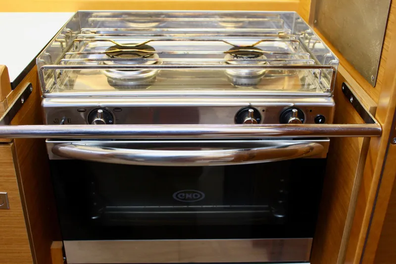 Slide: The Image of Stove and oven in 2015 Jeanneau Sun Odyssey 349 yacht kitchen. - 33