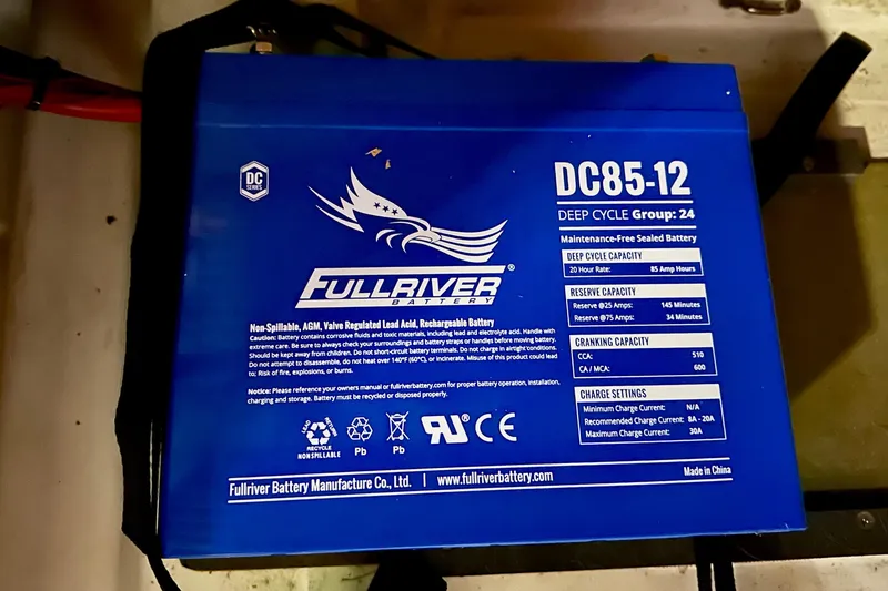 Slide: The Image of Fullriver DC85-12 deep cycle battery in a 2015 Jeanneau Sun Odyssey 349 sailboat. - 49
