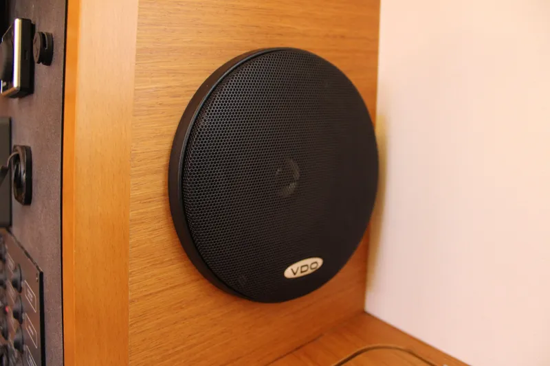 Slide: The Image of Speaker system on Jeanneau Sun Odyssey 349 yacht, 2015 model, with wooden paneling. - 60