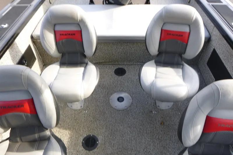 Slide: The Image of 2016 Tracker Targa V-18 WT boat interior with four cushioned seats. - 6