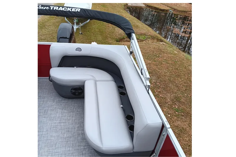 Slide: The Image of 2026 Sun Tracker Party Barge 16 DLX with comfortable seating and cup holders. - 15