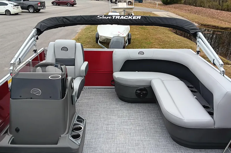 Slide: The Image of 2026 Sun Tracker Party Barge 16 DLX pontoon boat with spacious seating and modern design. - 22