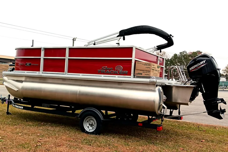 Slide: The Image of 2026 Sun Tracker Party Barge 16 DLX pontoon boat with Mercury outboard motor. - 5