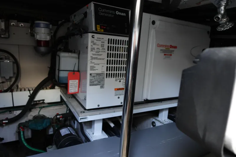 Slide: The Image of Interior view of 2012 Sea Ray 450 Sedan Bridge yacht with wooden flooring and modern design. - 33