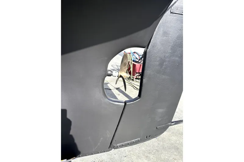 Slide: The Image of Close-up of a 2000 Sam L. Morse Bristol Channel Cutter 28 rudder and propeller. - 13