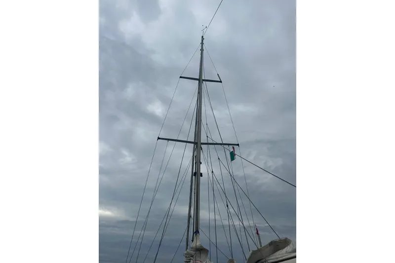 Slide: The Image of Mast of 2000 Sam L. Morse Bristol Channel Cutter 28 against cloudy sky. - 17