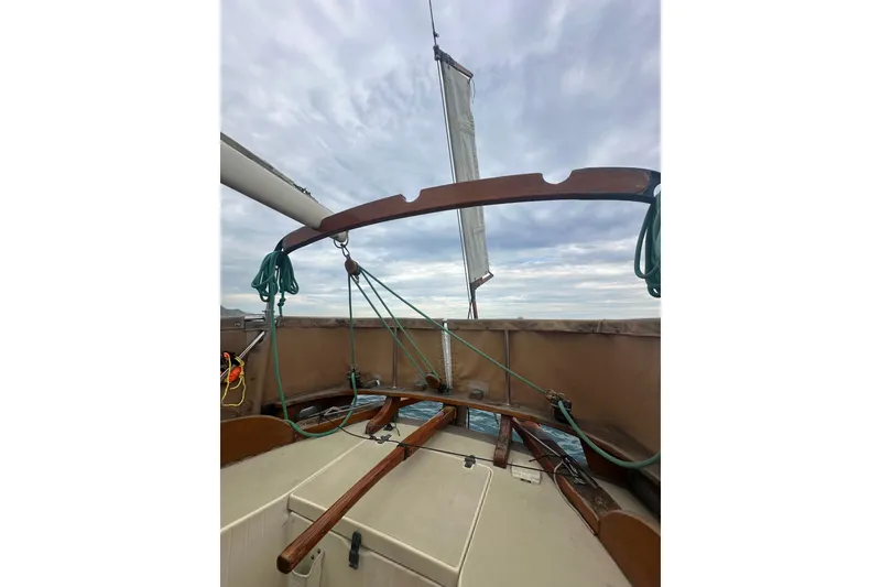 Slide: The Image of Cockpit view of 2000 Sam L. Morse Bristol Channel Cutter 28 sailboat under cloudy sky. - 23