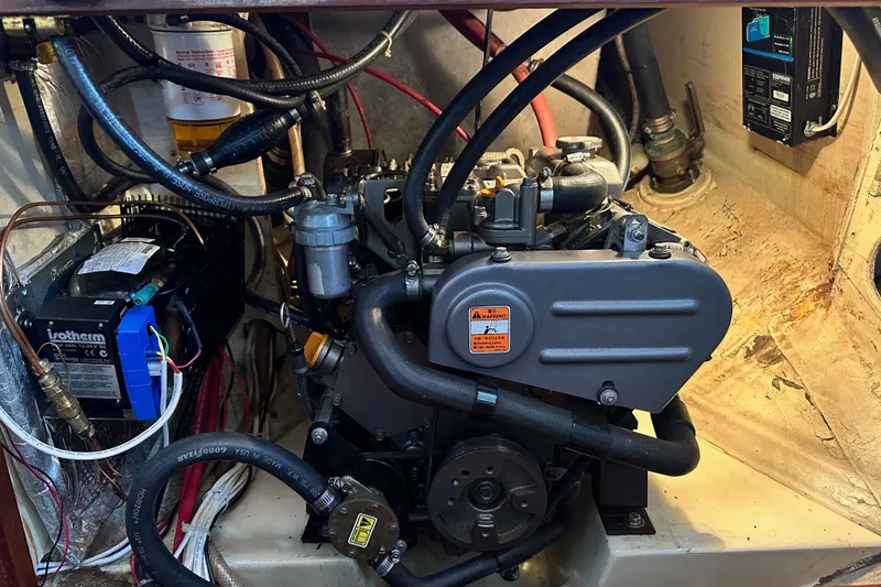 Slide: The Image of Engine compartment of a 2000 Sam L. Morse Bristol Channel Cutter 28 sailboat. - 9