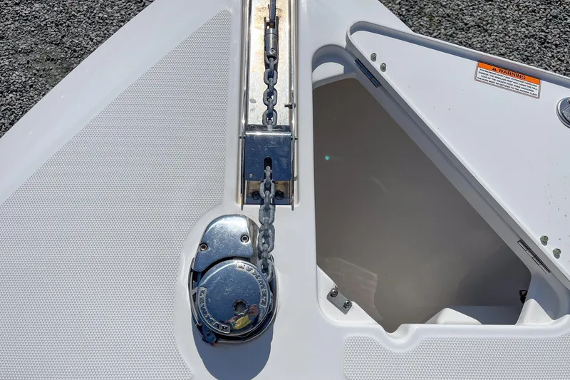 Slide: The Image of Anchor chain mechanism on a 2016 Everglades 255 Center Console boat. - 12