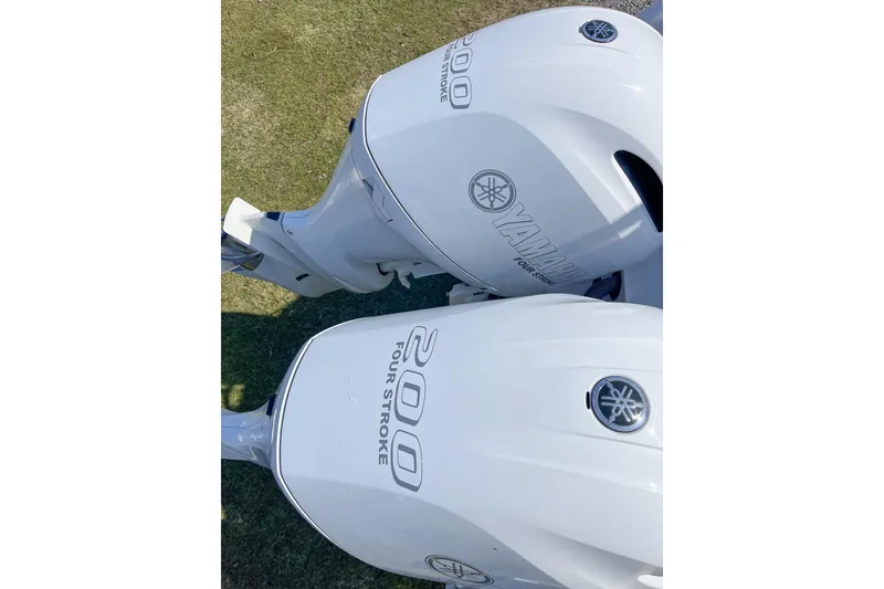 Slide: The Image of Twin Yamaha 200 Four Stroke outboard engines on 2016 Everglades 255 Center Console boat. - 15