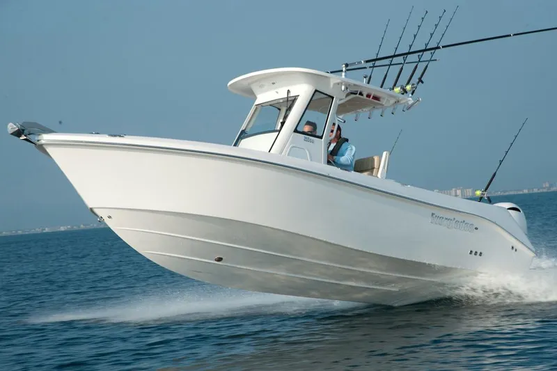 Slide: The Image of Manufacturer Provided Image: 2016 Everglades 255 Center Console boat cruising on open water. - 3