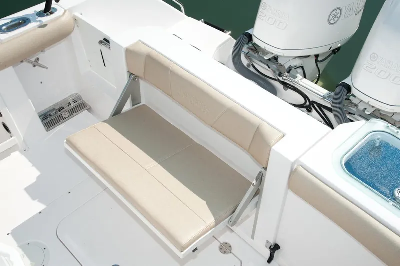 Slide: The Image of Manufacturer Provided Image: 2016 Everglades 255 Center Console boat with beige seating and dual Yamaha 200 engines. - 8