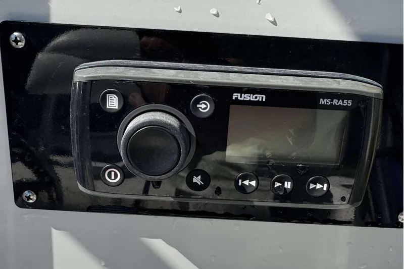 Slide: The Image of Fusion MS-RA55 marine stereo on 2012 Ranger 2410 Bay Ranger boat dashboard. - 29