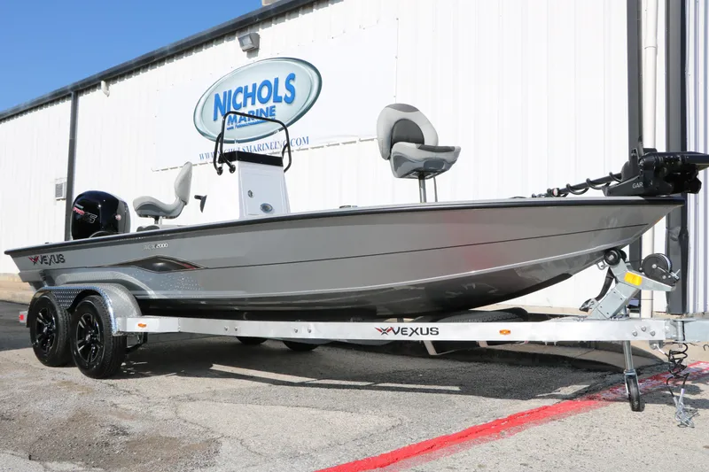 The Image of 2026 Vexus ACX2000 boat on trailer at Nichols Marine dealership. - 1