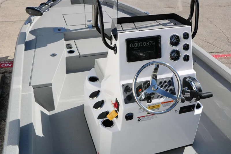 Slide: The Image of 2026 Vexus ACX2000 boat console with steering wheel and control panel. - 10