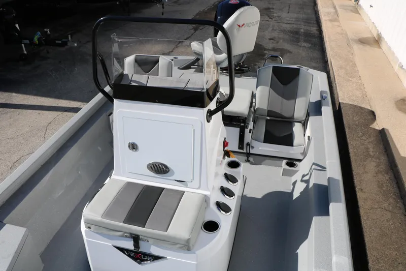 Slide: The Image of 2026 Vexus ACX2000 boat interior with seating and console, showcasing modern design. - 13