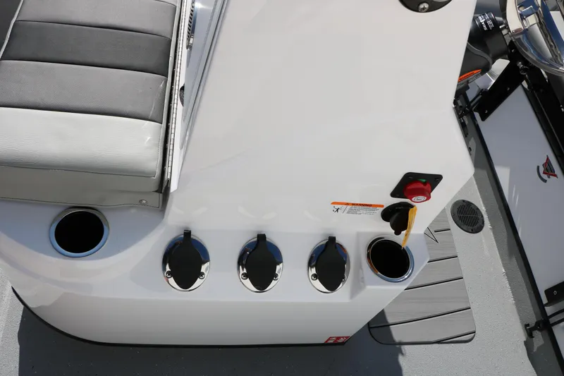 Slide: The Image of 2026 Vexus ACX2000 boat interior with seating and control panel details. - 22