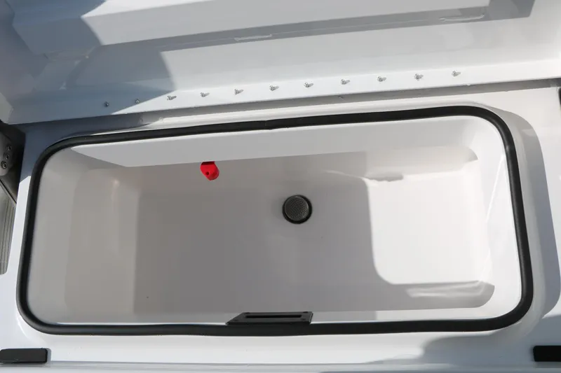 Slide: The Image of Open storage compartment of 2026 Vexus ACX2000 boat, featuring a sleek white interior. - 23