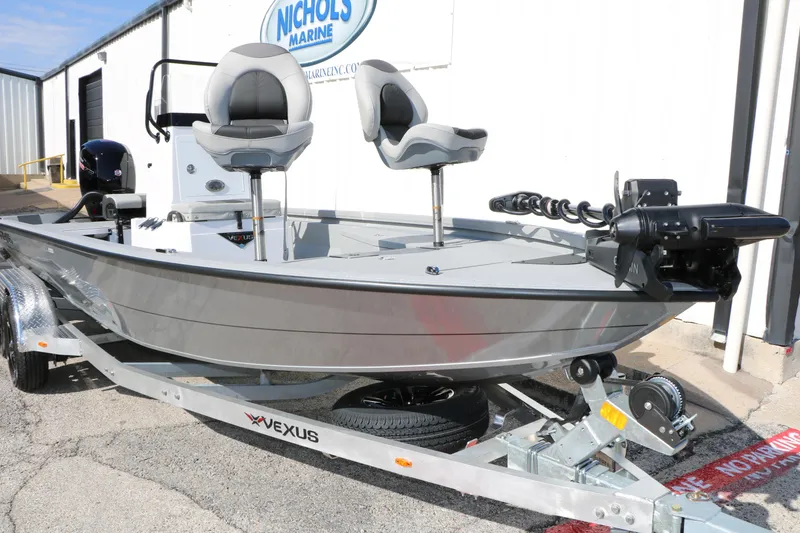Slide: The Image of 2026 Vexus ACX2000 boat on trailer, featuring dual seats and modern design. - 25