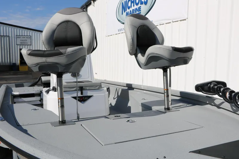 Slide: The Image of 2026 Vexus ACX2000 boat with dual swivel seats, displayed at Nichols Marine. - 26
