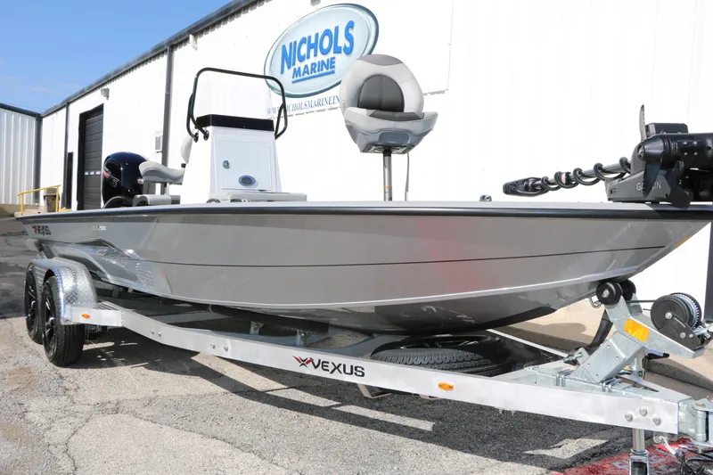 Slide: The Image of 2026 Vexus ACX2000 boat on trailer at Nichols Marine dealership. - 5